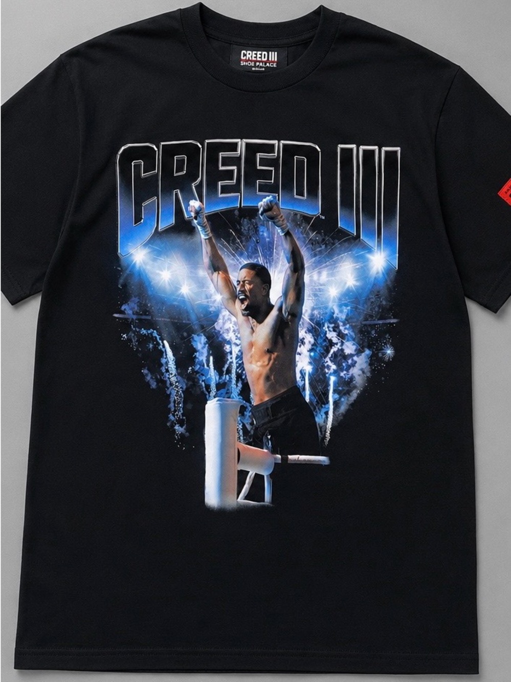 Creed Black Graphic Tee with Blue Spotlight Print